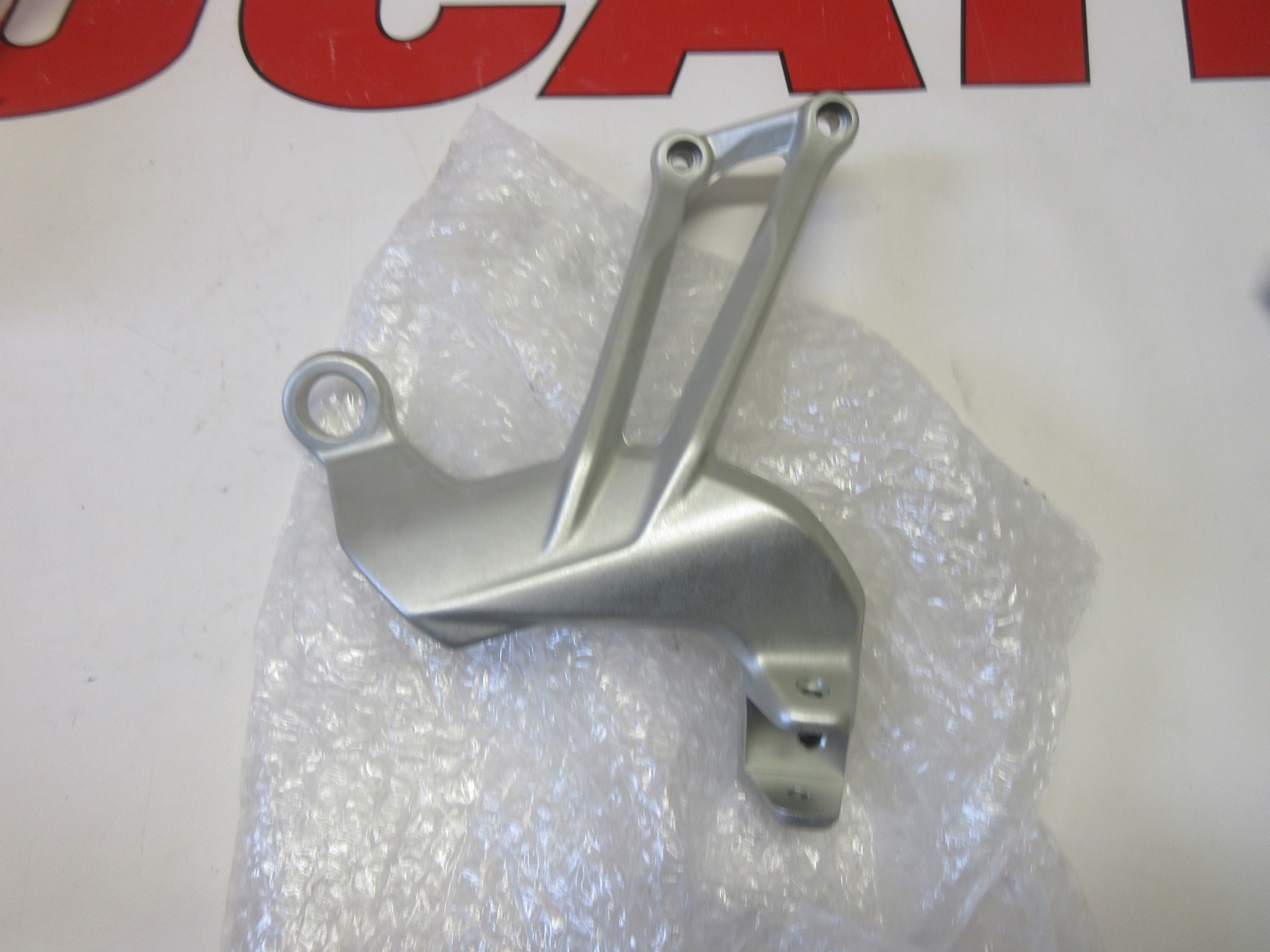 Ducati right rear passenger footrest holder Multistrada 1200 Enduro 82413131AA