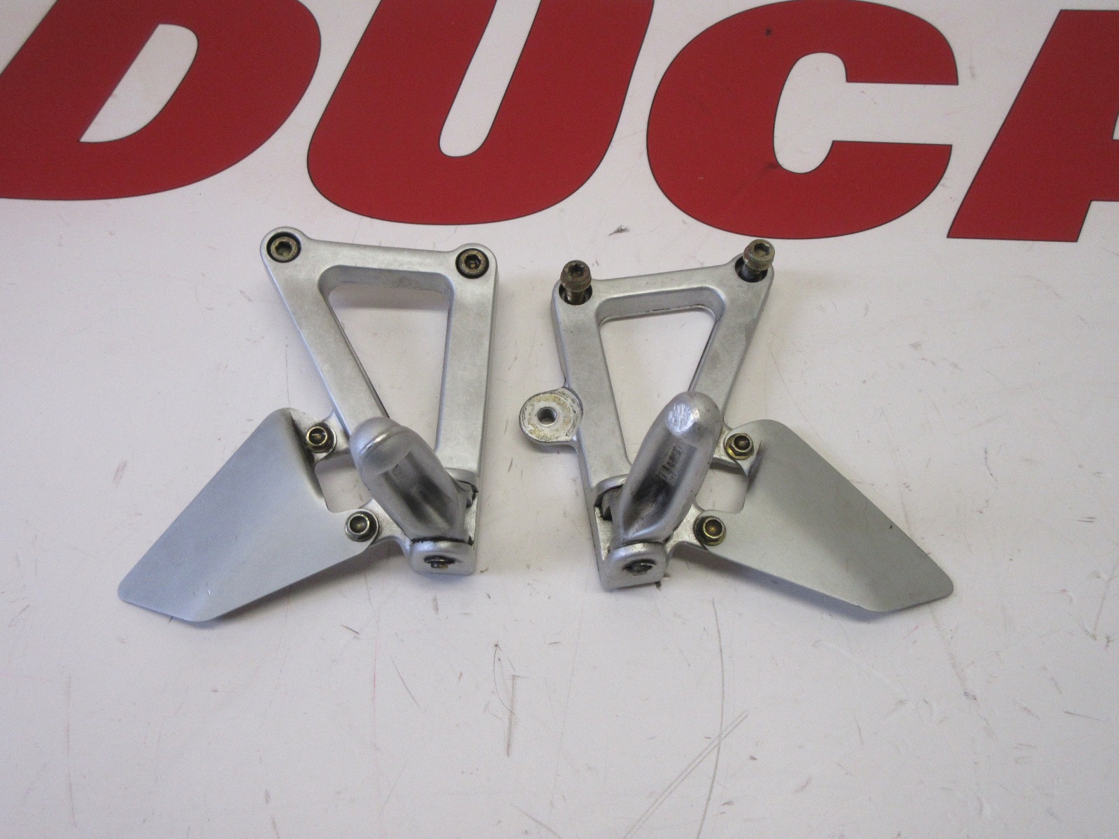 Ducati footrest hanger bracket left & right supersport 82410441A 620 750 800 900