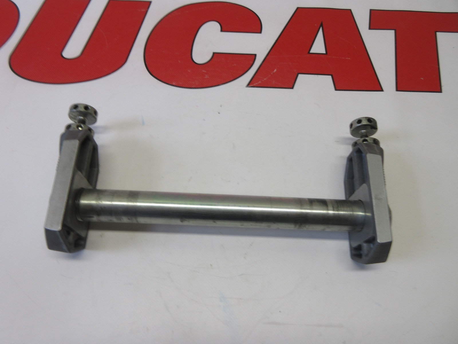 Ducati rear wheel axle & sliding shoe 749 999 superbikes 81910401A grey swingarm