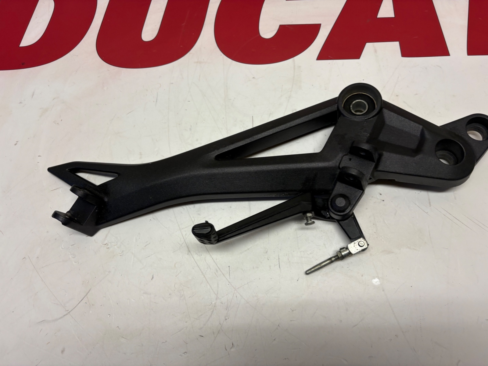 Ducati Monster 696 796 right footrest hanger & brake pedal black 45720461A