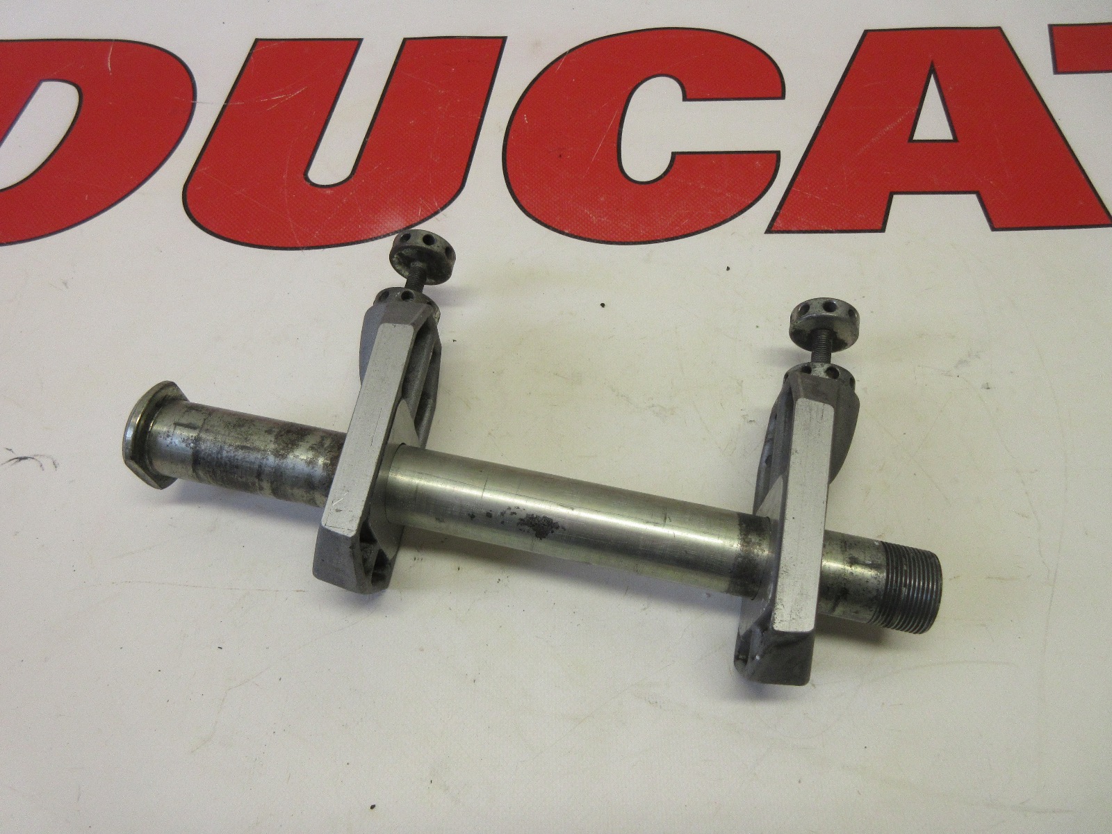 Ducati rear wheel axle & sliding shoe 749 999 superbikes grey swingarm 81910401A