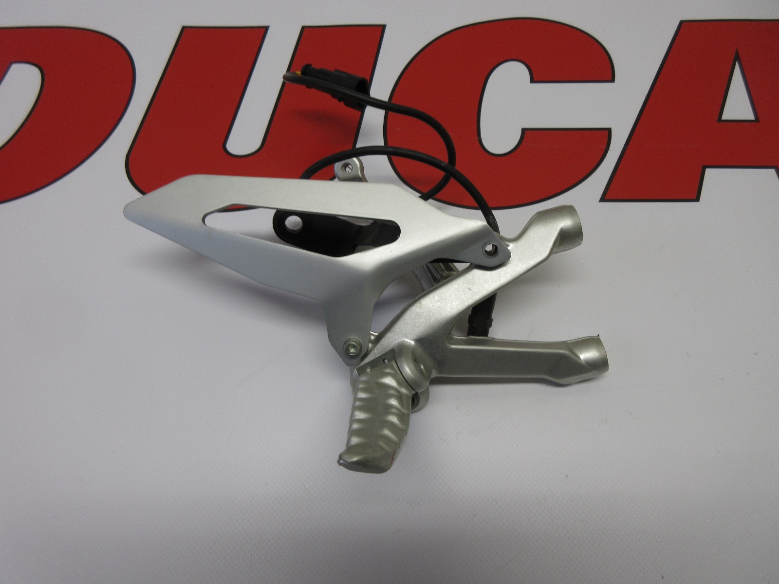 Ducati 82411871BA right hand footrest hanger & brake switch 899 1199