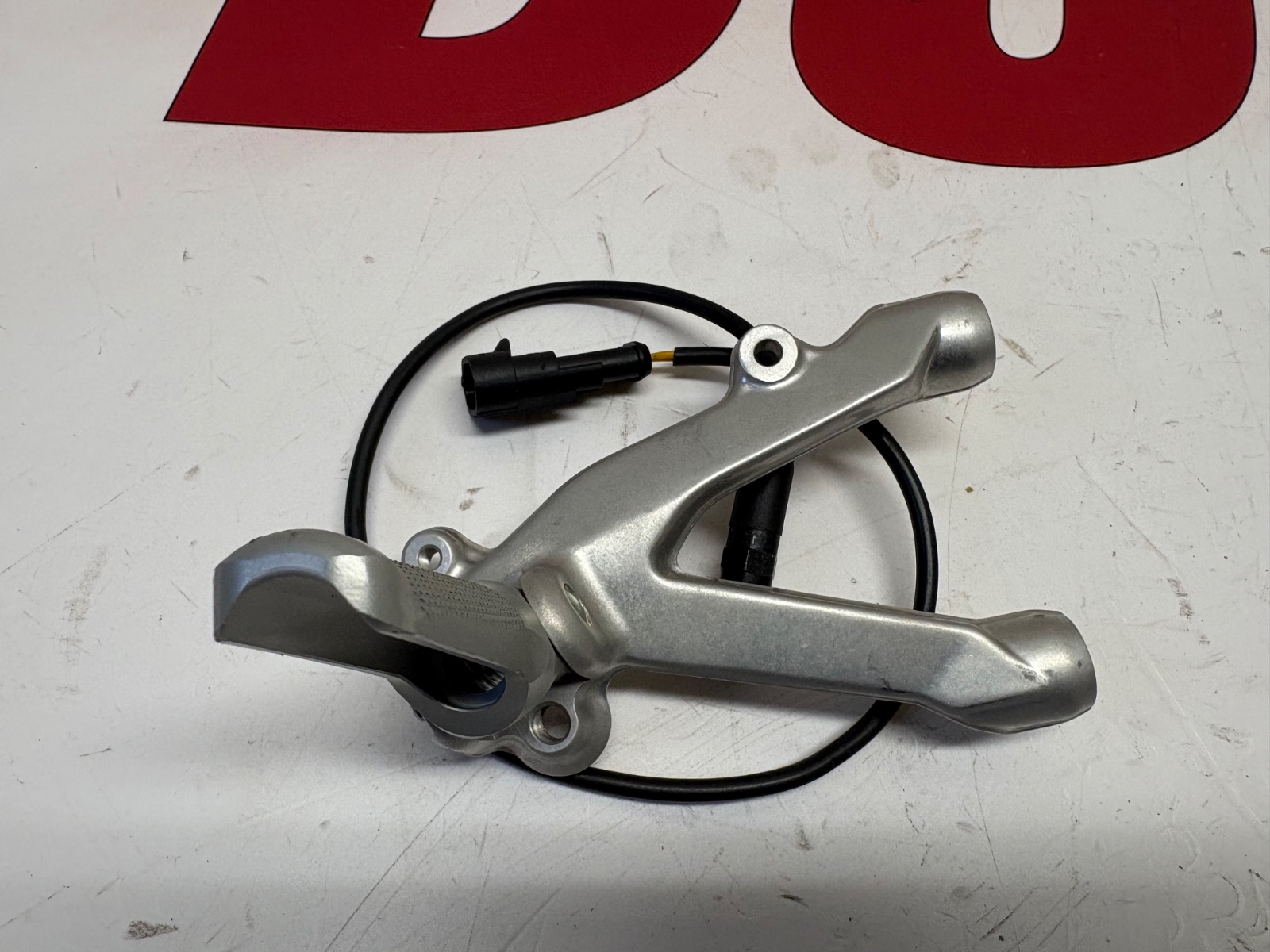 Ducati right footrest hanger 899 1199 959 1299 & tail light switch